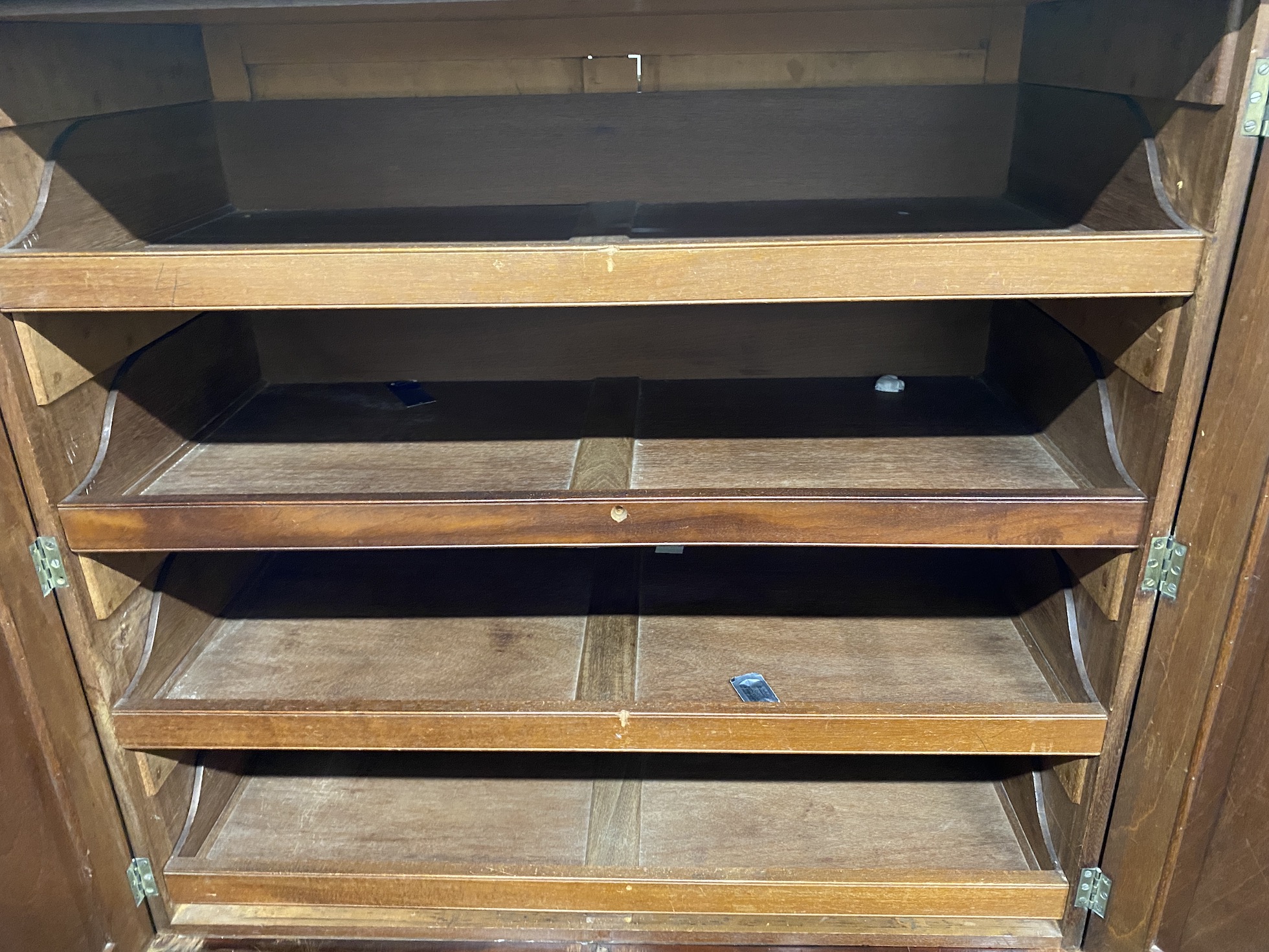 An early Victorian mahogany breakfront compactum wardrobe, width 220cm, depth 58cm, height 199cm